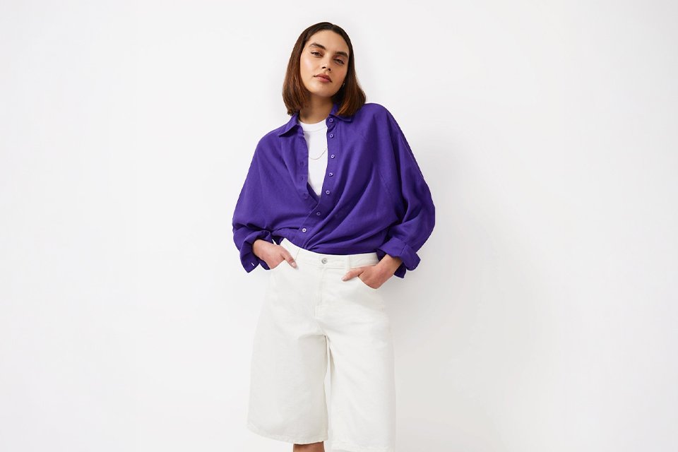 Lightweight summer layer styled with a relaxed top and trousers, ideal for warmer days with changing temperatures.