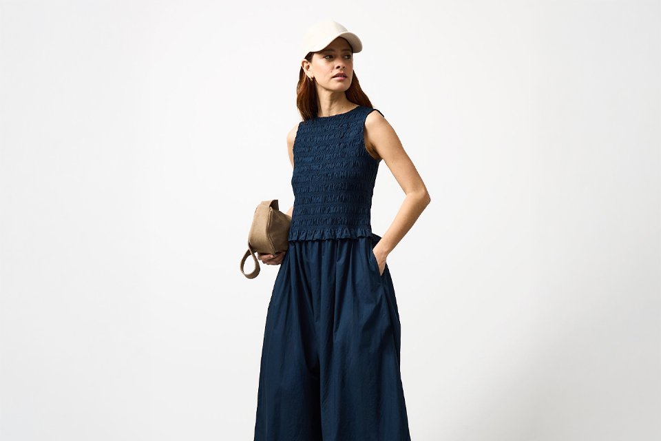Breezy summer dress with a relaxed silhouette, styled for easy daytime wear in warm weather.