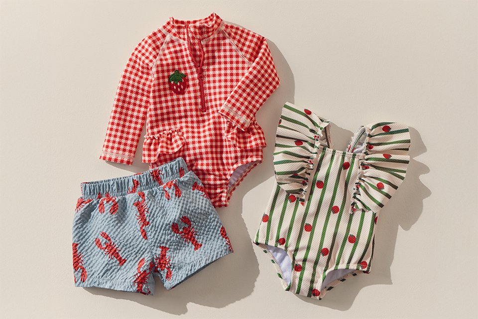 Newborn spring outfits with patterned tops, shorts and rompers.