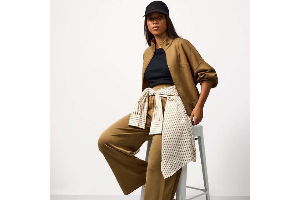 Relaxed loungewear set with soft joggers and layering pieces, designed for comfort and casual styling.