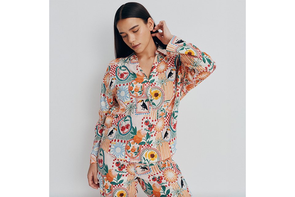 Printed pyjama set with long sleeve top and matching trousers, styled for comfortable women’s nightwear.