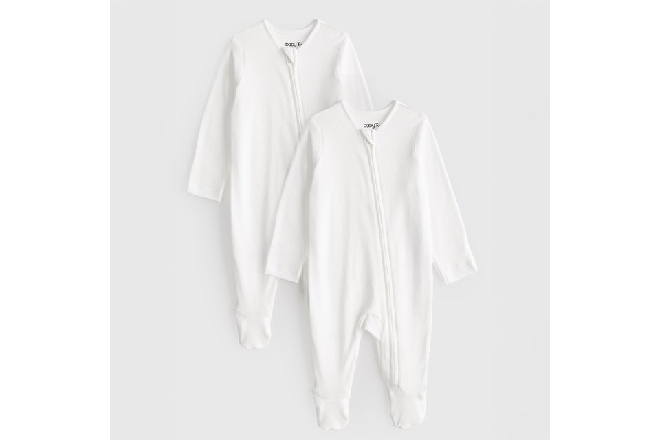 Baby sleepsuit with diagonal zip opening.