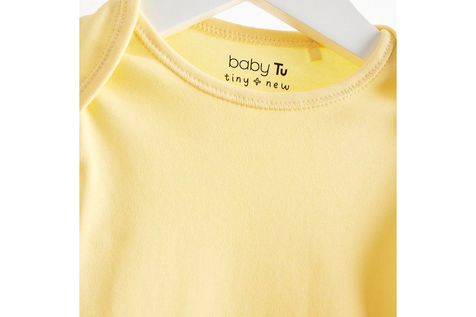Baby bodysuit with envelope neckline.