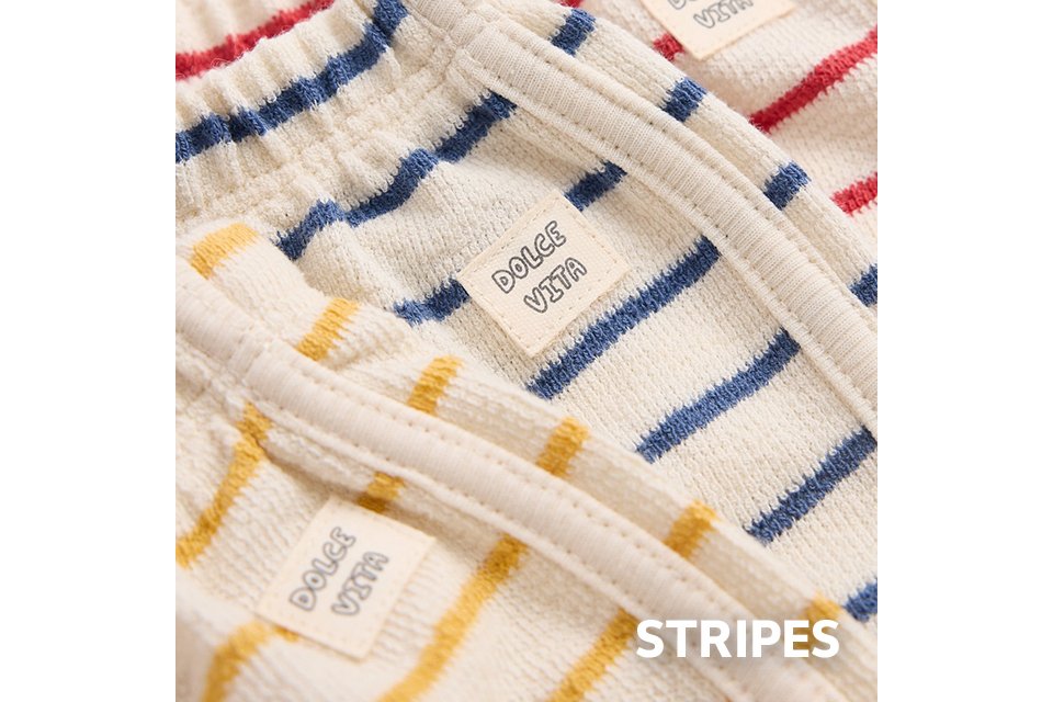 Striped baby sleepsuit in soft cotton. 