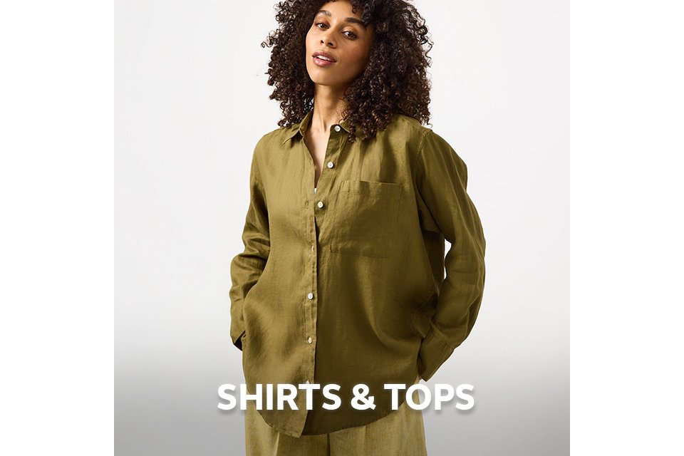 Woman wearing khaki green shirt with lighter green trousers.