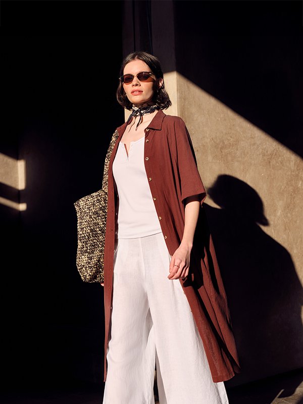 Lean into linen. Slip into pure elegance this spring with our minimalist linen. Nail your holiday look with relaxed shirts, lightweight trousers and effortless dresses, perfect for pairing with swimwear or denim for the day to night look. Switch it up from fresh white to earthy neutrals and rich blue.​