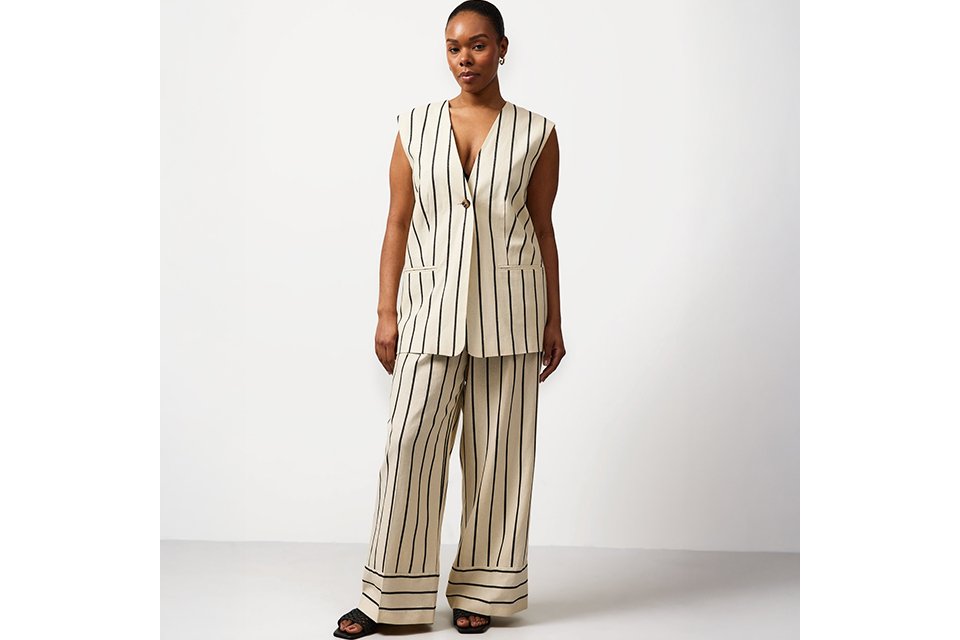 Printed pyjama set with long sleeve top and matching trousers, styled for comfortable women’s nightwear.