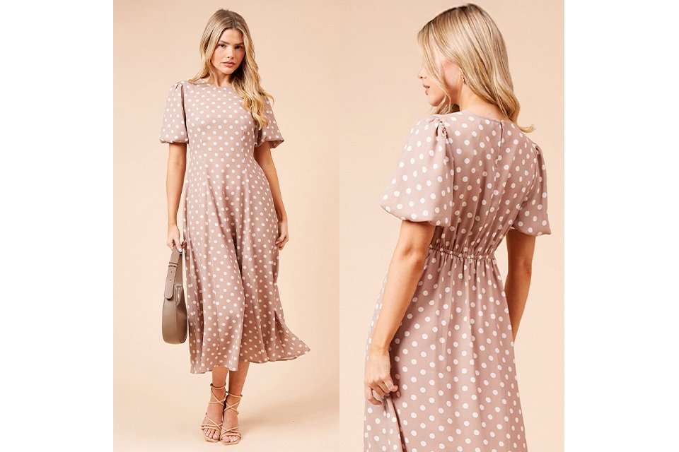 Back view of a polka dot midi dress with soft waist shaping, ideal for spring or summer wedding guests. 