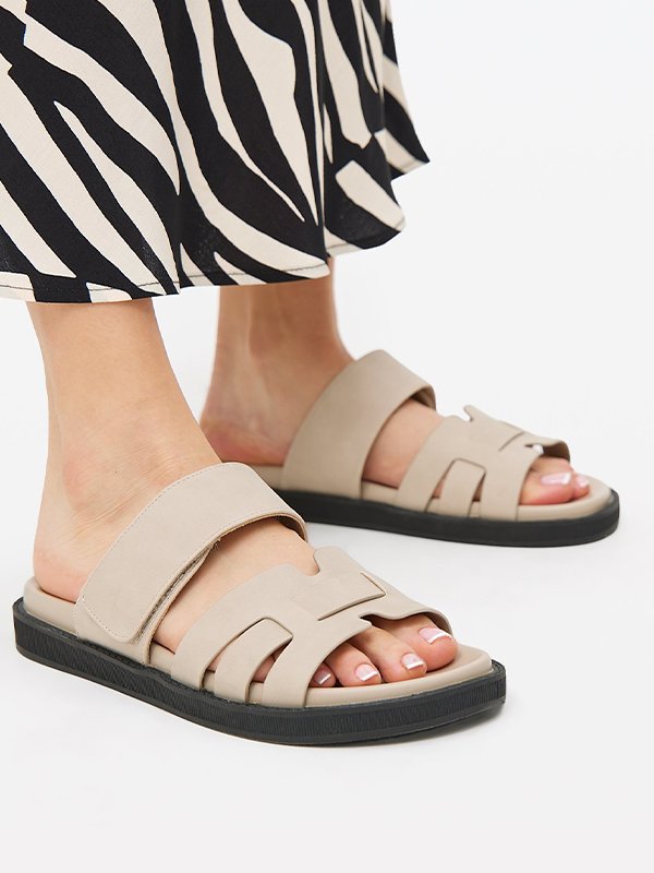 Shoes to complete the look. No outfit is complete without the perfect pair of shoes. Whether you're elevating your everyday essentials or adding the final touch to a statement ensemble find the pair that pulls it all together. Shop now.