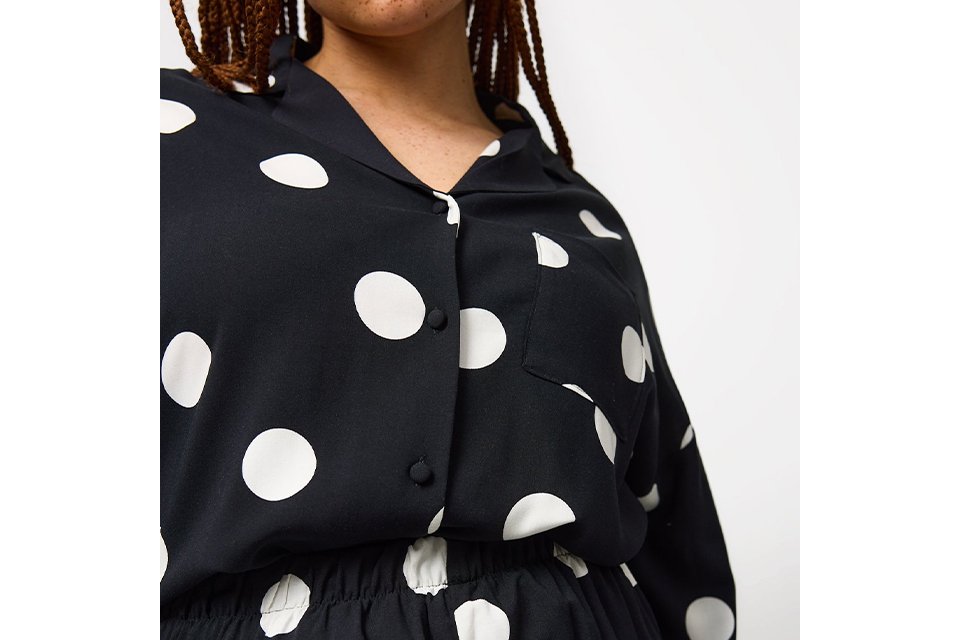 Black and white polka dot pyjama set with button front shirt.