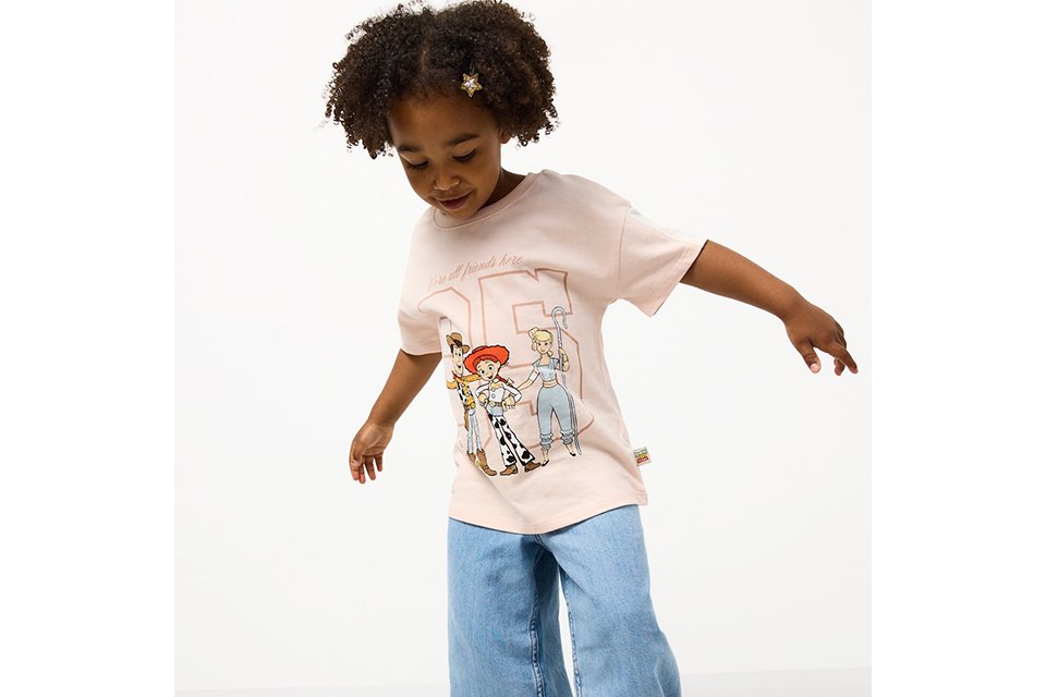 White broderie-style top with textured detailing, styled for women’s new‑in spring fashion.