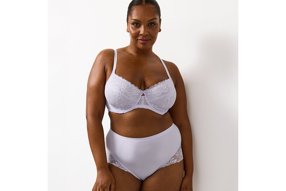 Purple lingerie set with a supportive bra and matching briefs, showcasing new‑in women’s lingerie styles.