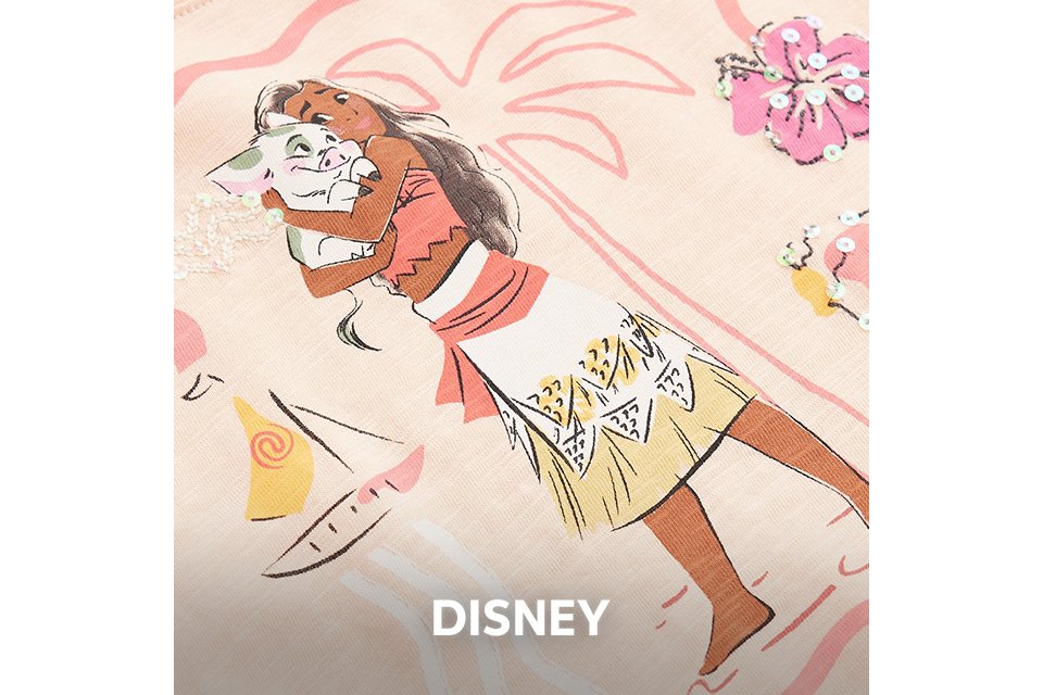 Close up shot of a piece of kids clothing showing a Disney Moana pattern.