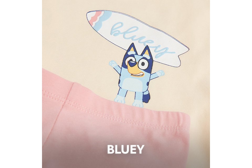 Close up shot of a piece of kids clothing showing a bluey motif.