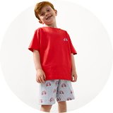 Kids' red short-sleeve pajama set featuring a bright red T-shirt and blue striped shorts with lifebuoy print.