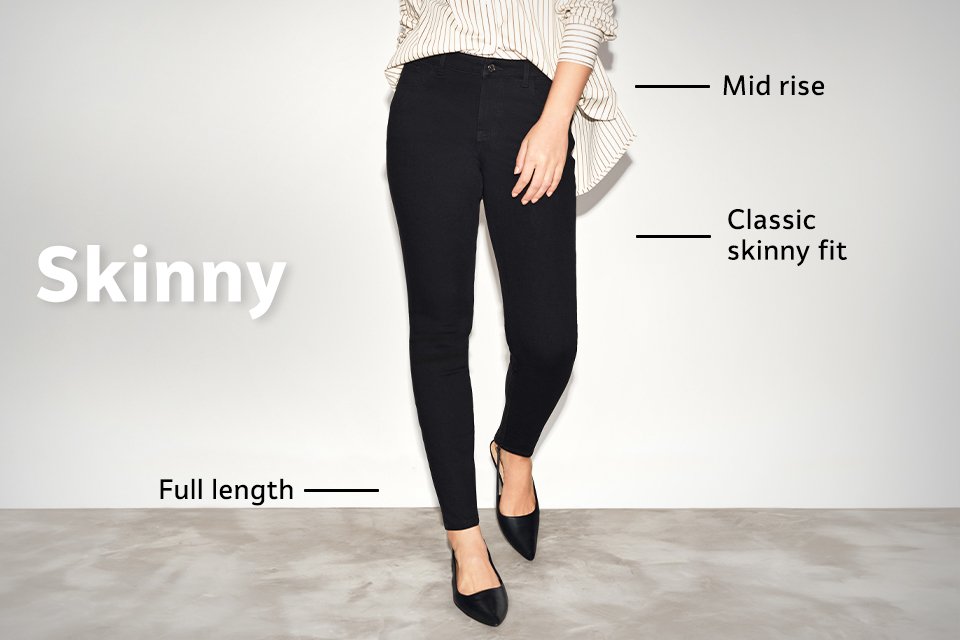 Mid-rise black skinny jeans with classic skinny fit and full-length design, styled with loafers and a striped shirt.