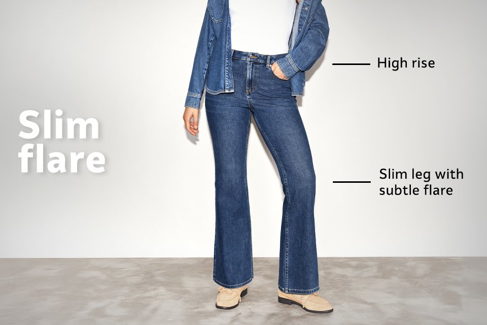 High-rise slim flare jeans in dark denim with subtle flare at the hem and slim leg fit, styled with boots.