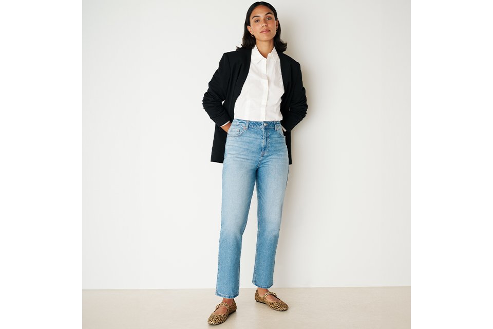 model wearing denim jeans.