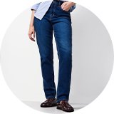 Blue striped button-down shirt paired with dark wash straight-leg jeans.