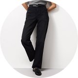 Grey knitted polo shirt with contrast collar paired with black high-waisted straight-leg trousers and loafers, styled for a smart casual women's look.