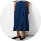 Dark wash denim midi wrap skirt with side buckle detail and an A-line silhouette.