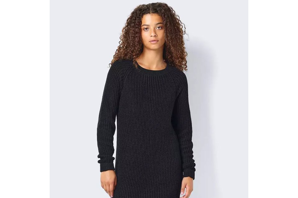 Black knitted jumper dress with long sleeves.