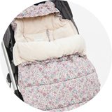 Floral footmuff in a pushchair.