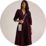 Wearing corduroy dress.