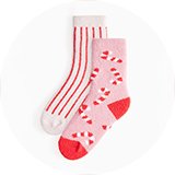 Festive Christmas socks with seasonal patterns for cosy winter comfort.