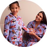 Matching festive Christmas pyjamas for a cosy seasonal night in with friends.