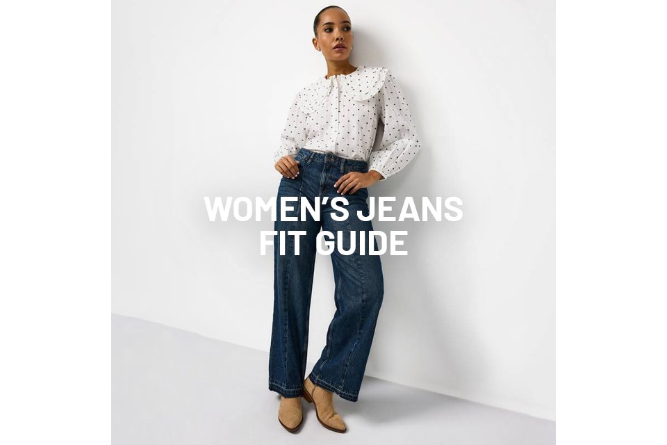 Woman wearing blue jeans and a white shirt with big collar. 