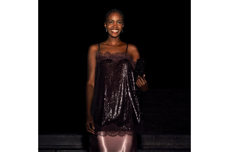 Women's black jacquard mini dress featuring a floral texture, keyhole necklineFashion models showcasing occasionwear, including a silver satin lace camisole with sheer lace sleeves and a black sequin slip dress with lace detailing. and cap sleeves.