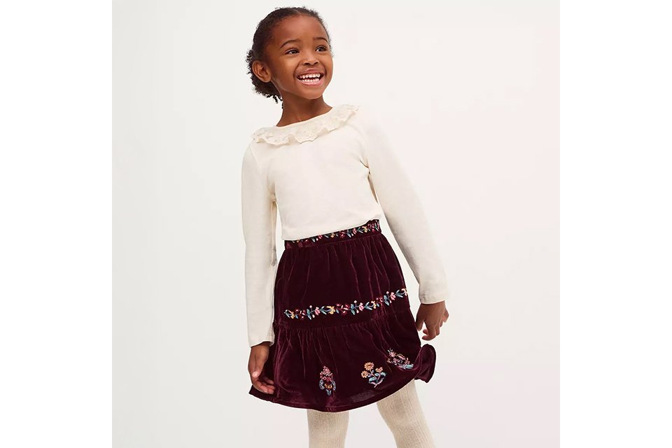 Children's ivory long-sleeve top with frill lace collar and a burgundy embroidered velvet skirt.