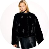 Faux fur coat – glamorous outerwear for winter parties.