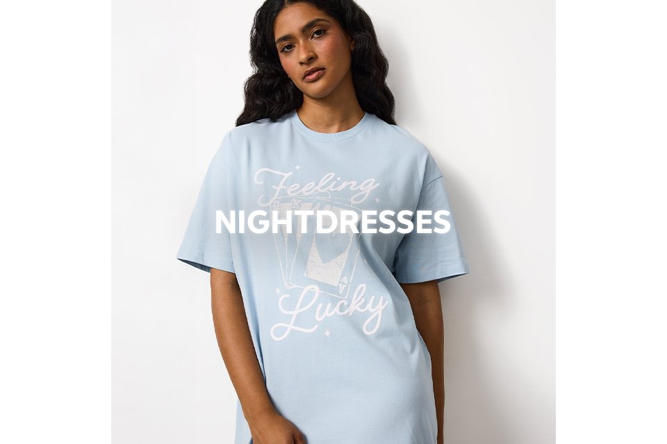 Light blue nightdress with white slogan text reading "Feeling Lucky."