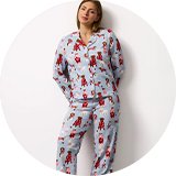 Full-length pyjama set with multicoloured print and button-up top.