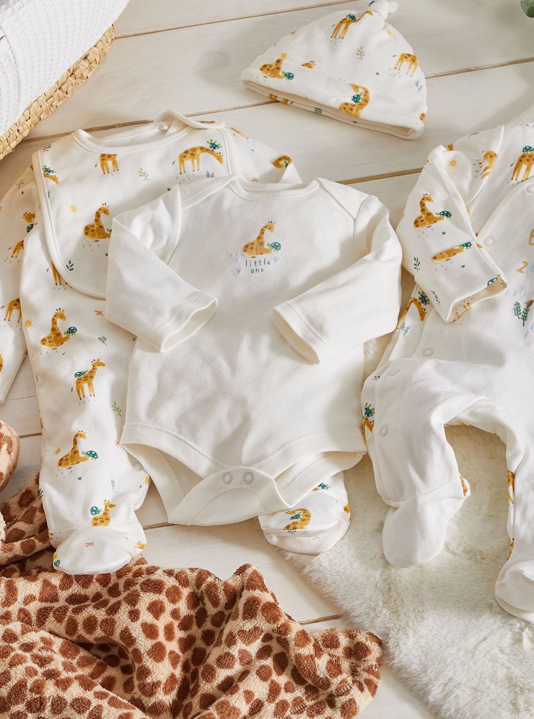 Sainsburys store newborn sleepsuits