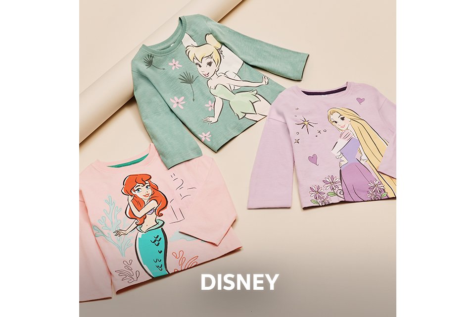 Assorted pastel tops featuring Disney princess character prints, including Ariel, Rapunzel, and others.