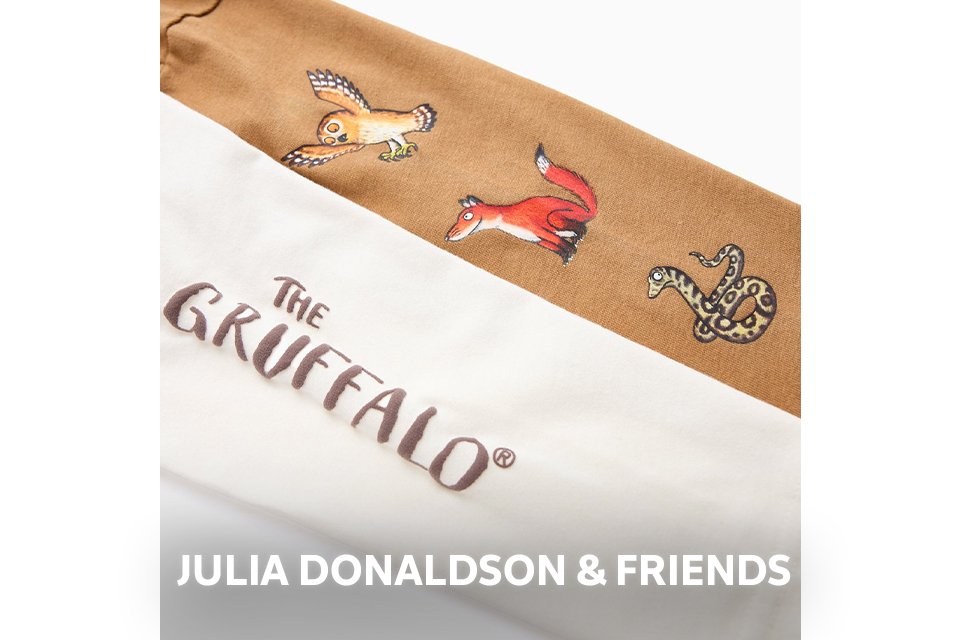 Close‑up of The Gruffalo logo on clothing with embroidered woodland animals.