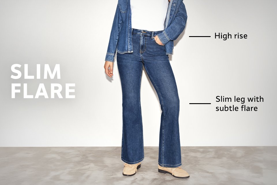 High-rise slim flare jeans in dark denim with subtle flare at the hem and slim leg fit, styled with boots.