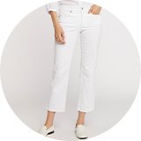 White wide-leg jeans paired with neutral-toned shoes for a chic outfit.