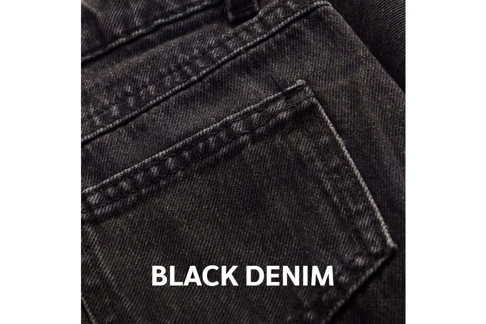 Close-up of the back pocket and waistband of black denim jeans, featuring tonal stitching and a classic five-pocket design.