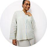 Full-length pyjama set with multicoloured print and button-up top.