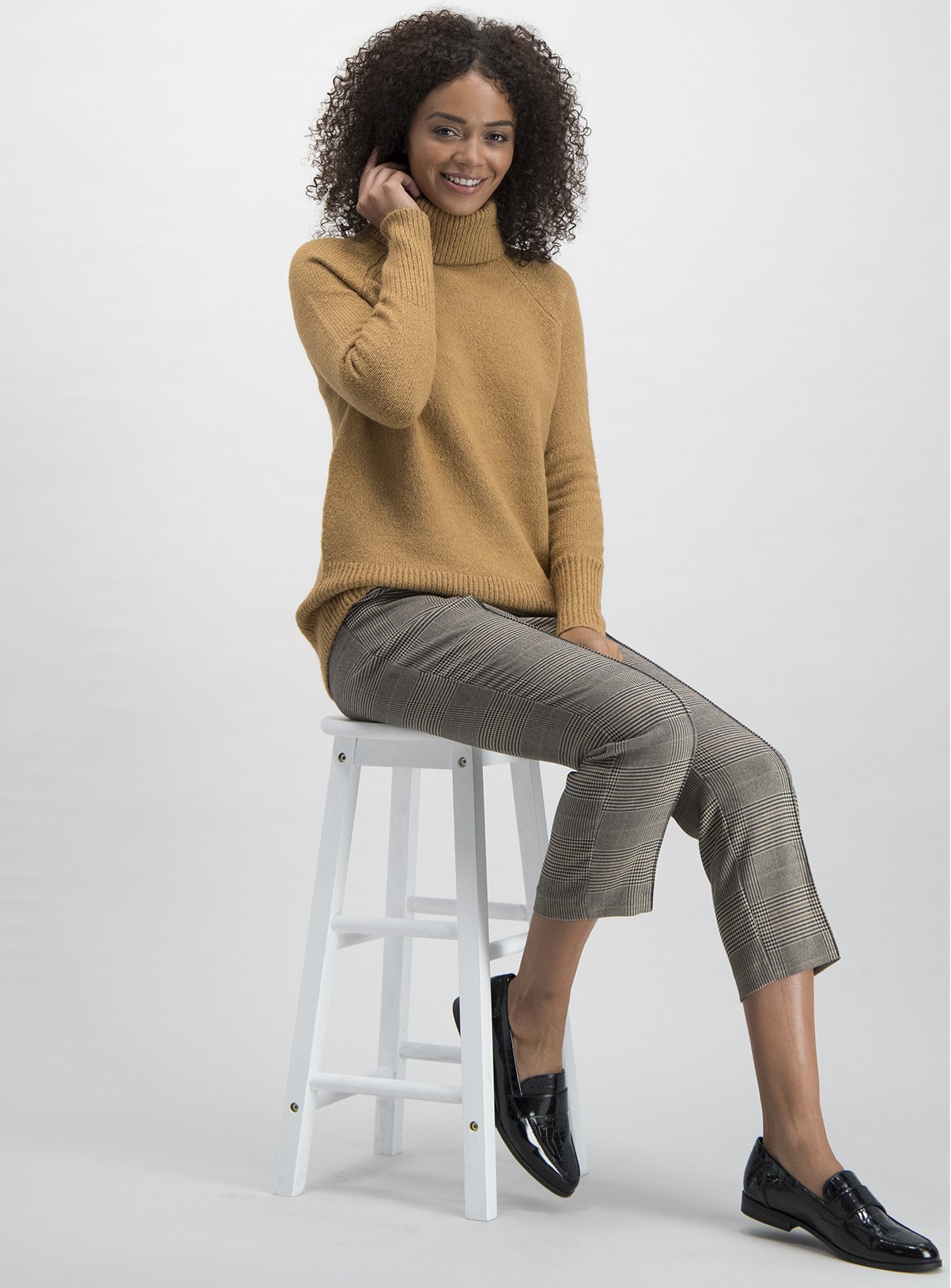 tan polo neck jumper