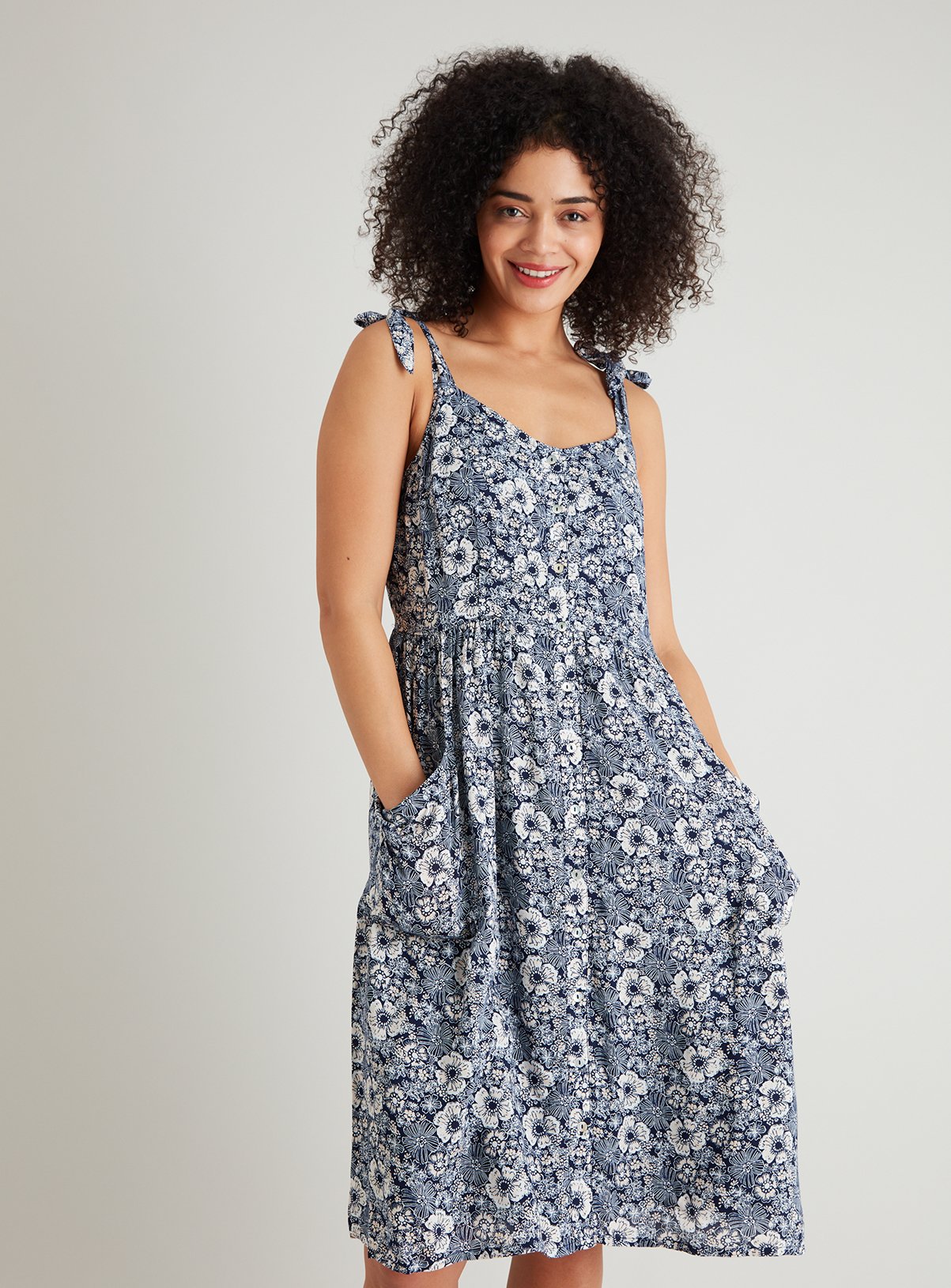 navy floral jumpsuits