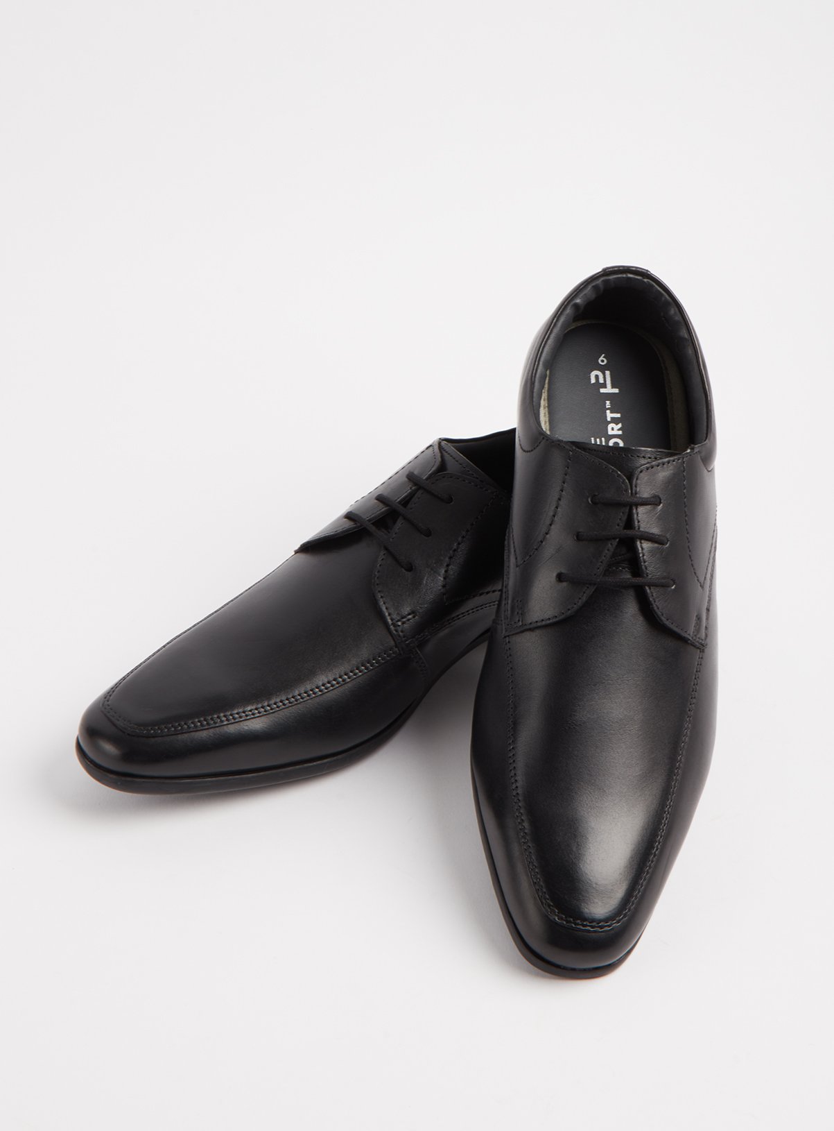 black dress shoes with white soles