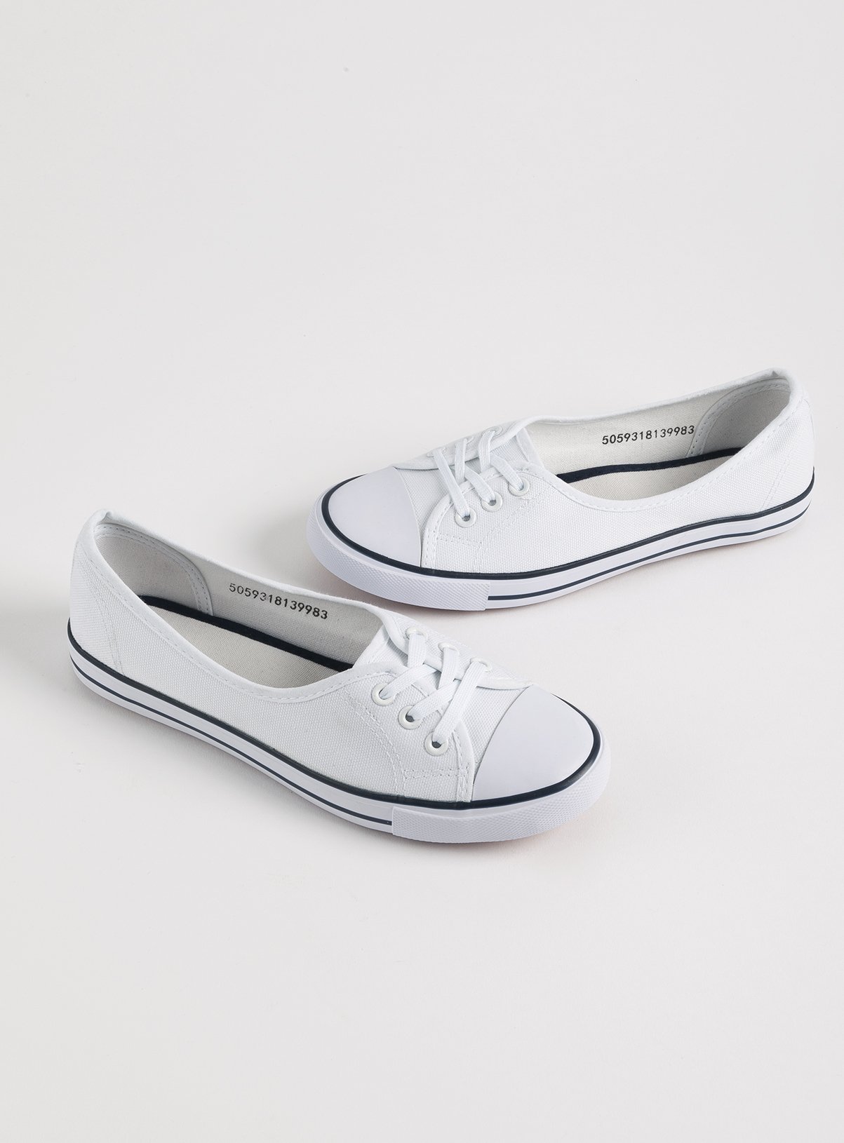 ladies white canvas pumps