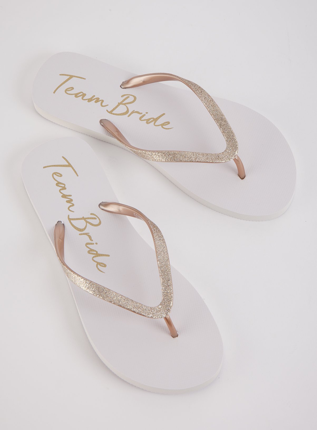 white glitter flip flops