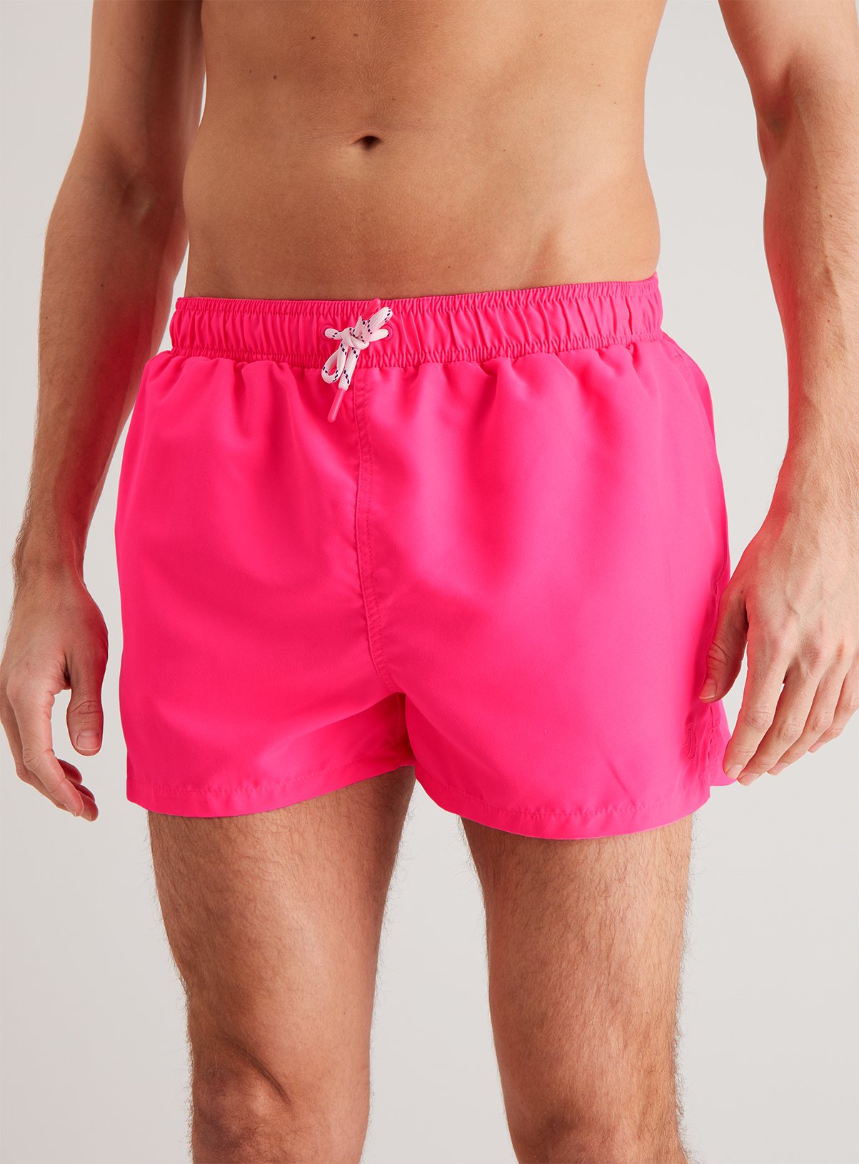 neon pink swim shorts