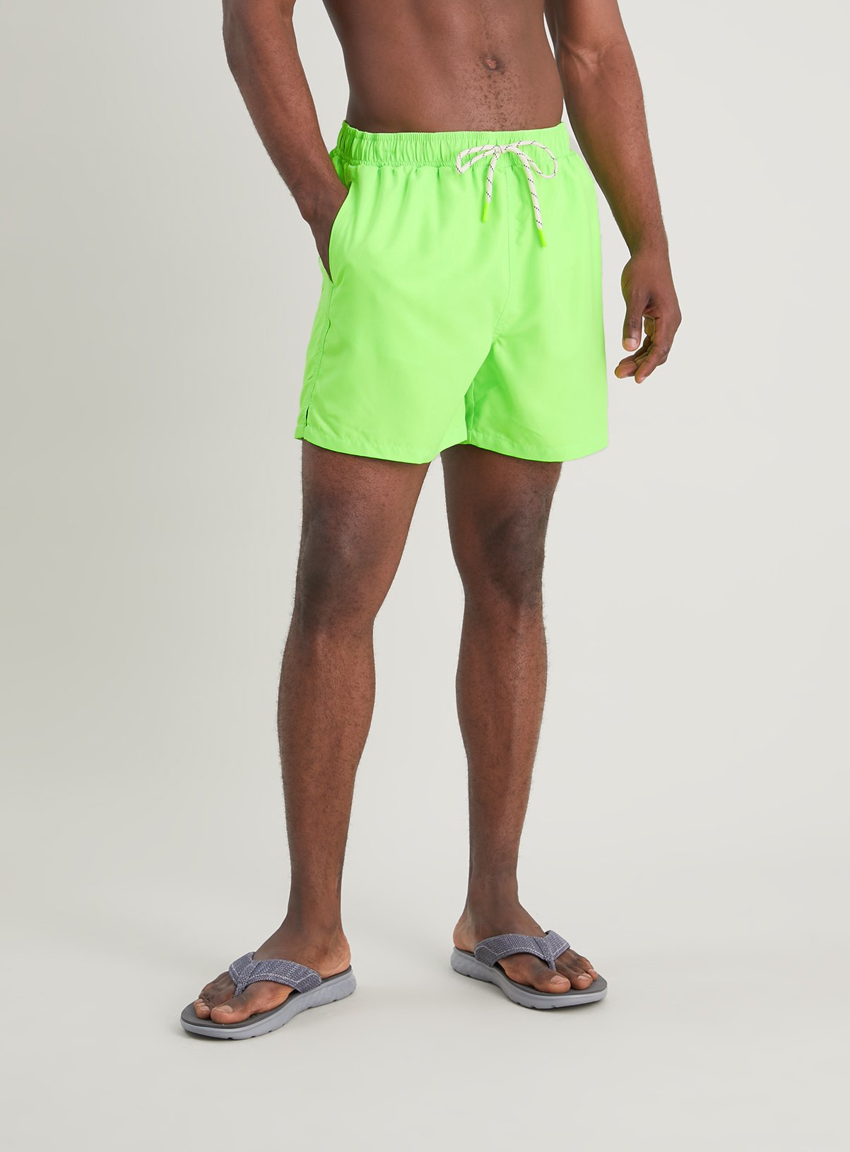 neon green swimming trunks
